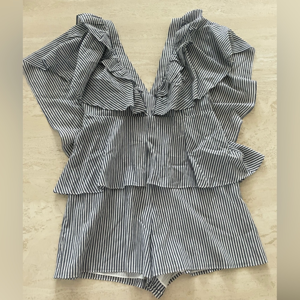 A beautiful and unique blue and white striped romper